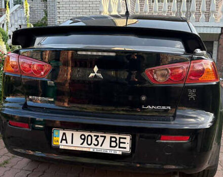 Черный Мицубиси Лансер, объемом двигателя 1.5 л и пробегом 111 тыс. км за 7500 $, фото 4 на Automoto.ua