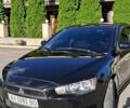 Черный Мицубиси Лансер, объемом двигателя 1.5 л и пробегом 204 тыс. км за 5600 $, фото 1 на Automoto.ua