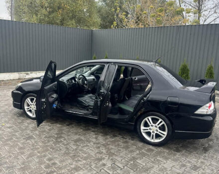 Чорний Міцубісі Lancer, об'ємом двигуна 2 л та пробігом 210 тис. км за 5500 $, фото 14 на Automoto.ua