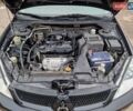 Чорний Міцубісі Lancer, об'ємом двигуна 1.6 л та пробігом 273 тис. км за 3999 $, фото 22 на Automoto.ua