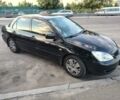 Черный Мицубиси Лансер, объемом двигателя 1.6 л и пробегом 206 тыс. км за 4794 $, фото 1 на Automoto.ua