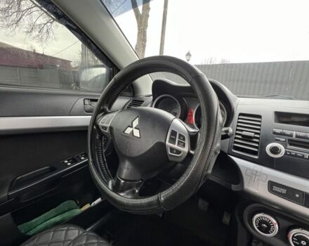 Чорний Міцубісі Lancer, об'ємом двигуна 2 л та пробігом 214 тис. км за 6800 $, фото 13 на Automoto.ua