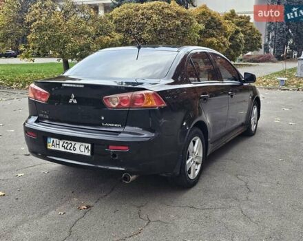 Міцубісі Lancer 2007 у Києві на Automoto.ua Чорний Міцубісі Lancer, об'ємом двигуна 2 л та пробігом 115 тис. км за 5000 $, фото 4 на Automoto.ua