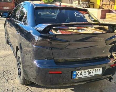 Мицубиси Лансер 2007 в Гостомель на Automoto.ua Черный Мицубиси Лансер, объемом двигателя 2 л и пробегом 258 тыс. км за 7200 $, фото 7 на Automoto.ua