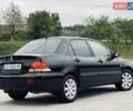 Чорний Міцубісі Lancer, об'ємом двигуна 1.6 л та пробігом 243 тис. км за 4950 $, фото 23 на Automoto.ua