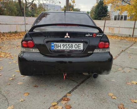 Мицубиси Лансер 2007 в Южноукраинске на Automoto.ua Черный Мицубиси Лансер, объемом двигателя 2 л и пробегом 161 тыс. км за 4600 $, фото 5 на Automoto.ua