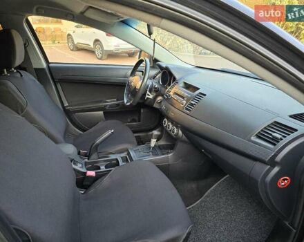 Чорний Міцубісі Lancer, об'ємом двигуна 2 л та пробігом 260 тис. км за 6555 $, фото 38 на Automoto.ua