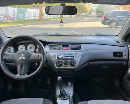 Чорний Міцубісі Lancer, об'ємом двигуна 1.58 л та пробігом 175 тис. км за 5200 $, фото 6 на Automoto.ua