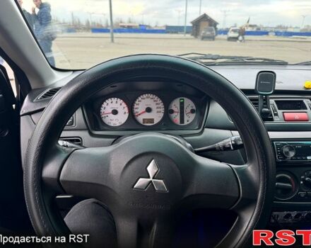 Чорний Міцубісі Lancer, об'ємом двигуна 1.6 л та пробігом 220 тис. км за 4200 $, фото 8 на Automoto.ua