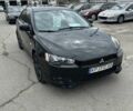 Черный Мицубиси Лансер, объемом двигателя 2 л и пробегом 205 тыс. км за 6500 $, фото 1 на Automoto.ua