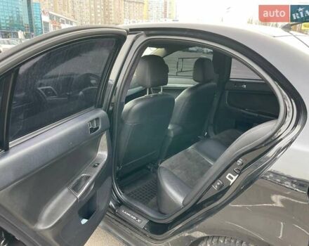 Черный Мицубиси Лансер, объемом двигателя 2 л и пробегом 246 тыс. км за 7500 $, фото 19 на Automoto.ua