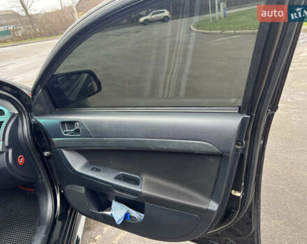 Черный Мицубиси Лансер, объемом двигателя 2 л и пробегом 350 тыс. км за 6700 $, фото 15 на Automoto.ua