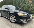 Чорний Міцубісі Lancer, об'ємом двигуна 2 л та пробігом 69 тис. км за 6200 $, фото 2 на Automoto.ua