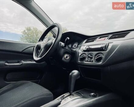 Чорний Міцубісі Lancer, об'ємом двигуна 1.6 л та пробігом 243 тис. км за 4950 $, фото 31 на Automoto.ua