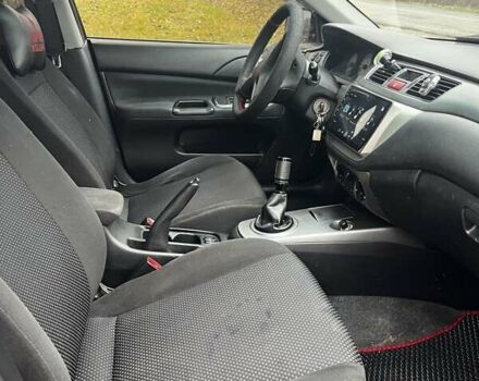 Черный Мицубиси Лансер, объемом двигателя 1.6 л и пробегом 272 тыс. км за 2800 $, фото 12 на Automoto.ua