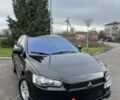 Черный Мицубиси Лансер, объемом двигателя 2 л и пробегом 350 тыс. км за 6700 $, фото 1 на Automoto.ua