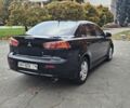 Черный Мицубиси Лансер, объемом двигателя 2 л и пробегом 115 тыс. км за 5000 $, фото 7 на Automoto.ua