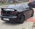 Черный Мицубиси Лансер, объемом двигателя 2 л и пробегом 217 тыс. км за 5500 $, фото 7 на Automoto.ua