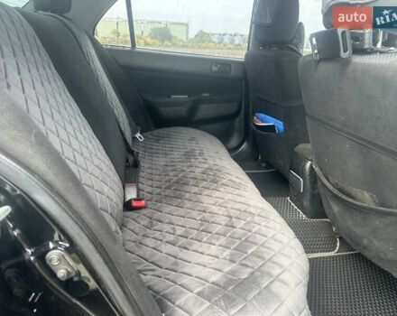 Чорний Міцубісі Lancer, об'ємом двигуна 1.6 л та пробігом 310 тис. км за 5100 $, фото 10 на Automoto.ua