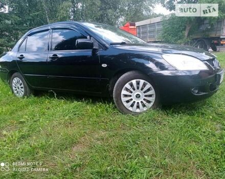 Чорний Міцубісі Lancer, об'ємом двигуна 1.58 л та пробігом 400 тис. км за 3700 $, фото 18 на Automoto.ua