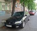 Черный Мицубиси Лансер, объемом двигателя 1.58 л и пробегом 345 тыс. км за 4199 $, фото 1 на Automoto.ua