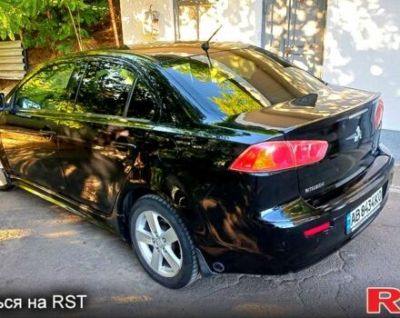 Черный Мицубиси Лансер, объемом двигателя 2 л и пробегом 290 тыс. км за 5800 $, фото 6 на Automoto.ua