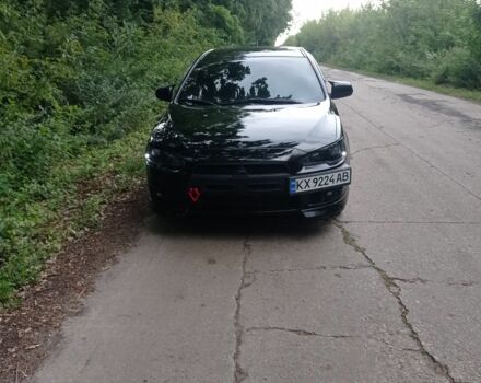 Черный Мицубиси Лансер, объемом двигателя 2 л и пробегом 245 тыс. км за 7500 $, фото 3 на Automoto.ua