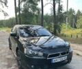 Черный Мицубиси Лансер, объемом двигателя 2 л и пробегом 340 тыс. км за 3700 $, фото 1 на Automoto.ua