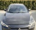 Чорний Міцубісі Lancer, об'ємом двигуна 2 л та пробігом 268 тис. км за 7000 $, фото 1 на Automoto.ua