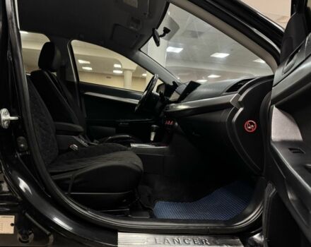 Чорний Міцубісі Lancer, об'ємом двигуна 1.5 л та пробігом 201 тис. км за 6900 $, фото 6 на Automoto.ua