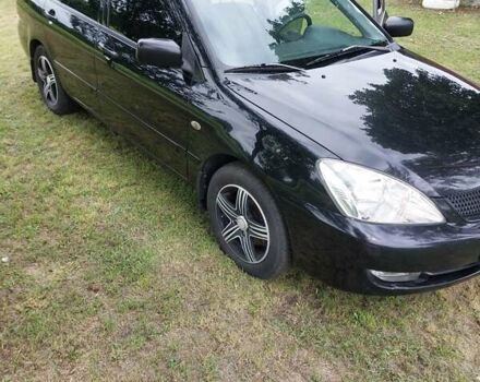 Чорний Міцубісі Lancer, об'ємом двигуна 1.6 л та пробігом 210 тис. км за 5500 $, фото 4 на Automoto.ua