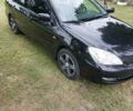 Чорний Міцубісі Lancer, об'ємом двигуна 1.6 л та пробігом 210 тис. км за 5500 $, фото 4 на Automoto.ua