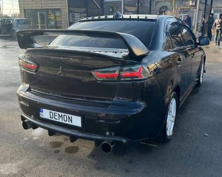 Чорний Міцубісі Lancer, об'ємом двигуна 2 л та пробігом 226 тис. км за 7200 $, фото 1 на Automoto.ua