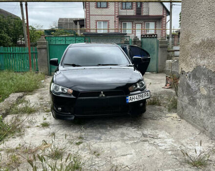 Чорний Міцубісі Lancer, об'ємом двигуна 2 л та пробігом 200 тис. км за 6900 $, фото 3 на Automoto.ua