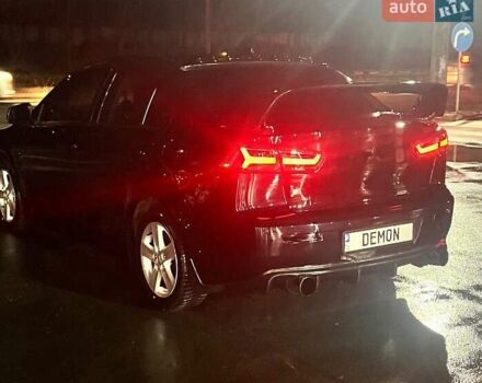 Чорний Міцубісі Lancer, об'ємом двигуна 2 л та пробігом 226 тис. км за 7200 $, фото 15 на Automoto.ua