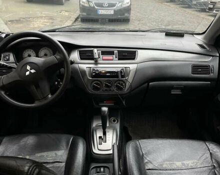 Чорний Міцубісі Lancer, об'ємом двигуна 1.6 л та пробігом 213 тис. км за 3000 $, фото 8 на Automoto.ua