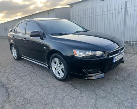 Черный Мицубиси Лансер, объемом двигателя 2 л и пробегом 170 тыс. км за 7900 $, фото 1 на Automoto.ua