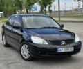 Черный Мицубиси Лансер, объемом двигателя 1.6 л и пробегом 205 тыс. км за 5100 $, фото 1 на Automoto.ua