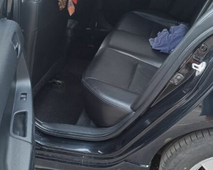 Черный Мицубиси Лансер, объемом двигателя 2 л и пробегом 210 тыс. км за 6000 $, фото 10 на Automoto.ua