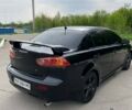 Чорний Міцубісі Lancer, об'ємом двигуна 2 л та пробігом 270 тис. км за 7000 $, фото 14 на Automoto.ua