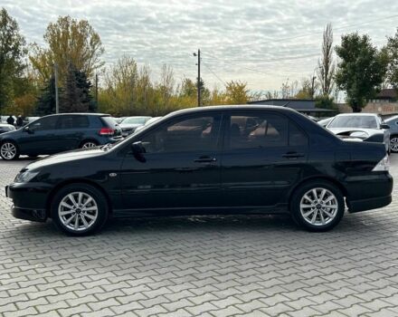 Мицубиси Лансер 2007 в Кривом Роге на Automoto.ua Черный Мицубиси Лансер, объемом двигателя 2 л и пробегом 143 тыс. км за 5400 $, фото 3 на Automoto.ua