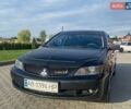 Черный Мицубиси Лансер, объемом двигателя 1.6 л и пробегом 267 тыс. км за 4200 $, фото 1 на Automoto.ua