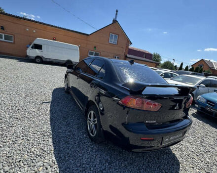 Чорний Міцубісі Lancer, об'ємом двигуна 2 л та пробігом 253 тис. км за 6400 $, фото 5 на Automoto.ua