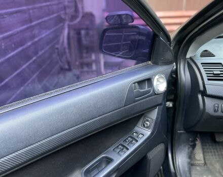 Чорний Міцубісі Lancer, об'ємом двигуна 2 л та пробігом 175 тис. км за 6500 $, фото 10 на Automoto.ua