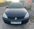 Чорний Міцубісі Lancer, об'ємом двигуна 1.58 л та пробігом 208 тис. км за 4000 $, фото 1 на Automoto.ua