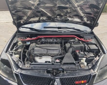 Міцубісі Lancer 2007 у Кам'янське (Дніпродзержинськ) на Automoto.ua Чорний Міцубісі Lancer, об'ємом двигуна 2 л та пробігом 268 тис. км за 5999 $, фото 7 на Automoto.ua