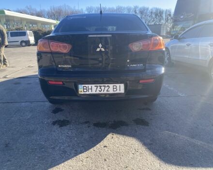 Черный Мицубиси Лансер, объемом двигателя 2 л и пробегом 372 тыс. км за 6200 $, фото 5 на Automoto.ua