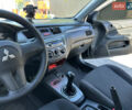 Чорний Міцубісі Lancer, об'ємом двигуна 1.58 л та пробігом 191 тис. км за 4899 $, фото 13 на Automoto.ua