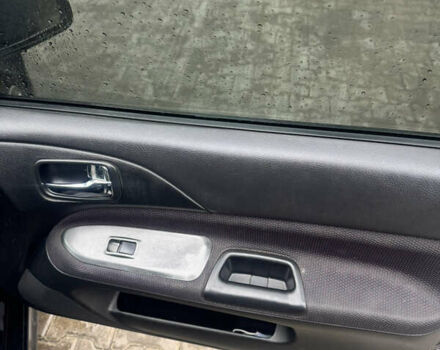 Чорний Міцубісі Lancer, об'ємом двигуна 2 л та пробігом 210 тис. км за 5500 $, фото 27 на Automoto.ua