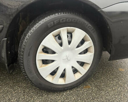 Чорний Міцубісі Lancer, об'ємом двигуна 1.58 л та пробігом 256 тис. км за 3700 $, фото 28 на Automoto.ua